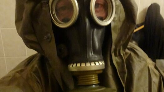 PervLinda Gumlin with gas mask and NVA Coat