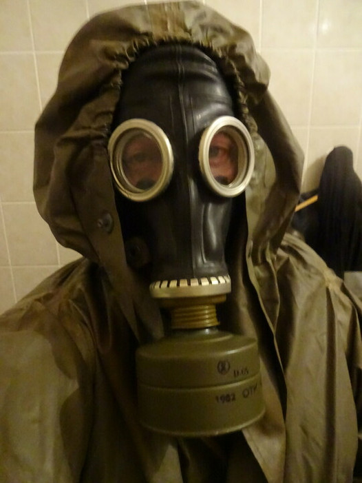 PervLinda Gumlin with gas mask and NVA Coat