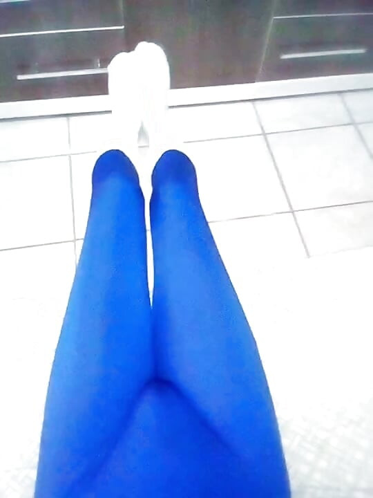 Fun at home wearing a blue Zentai costume with socks