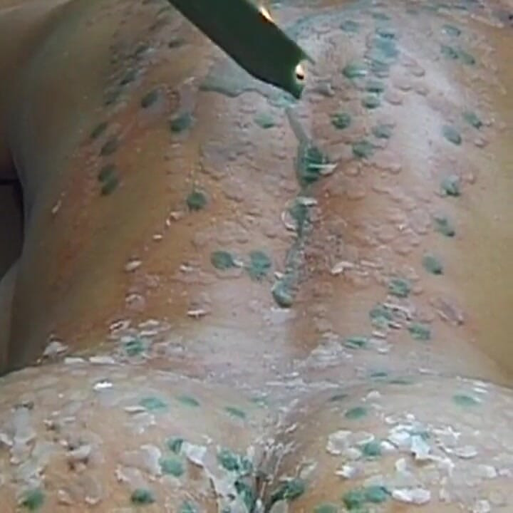 Mature MILF Enjoys Hot Wax Dripping Across Her Ass