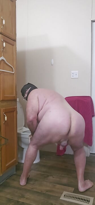 Nasty completely nude exhibitionist in the bathroom.