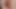 Close up on small flaccid penis foreskin dropping displayed hands free British uncut cock with some pubes