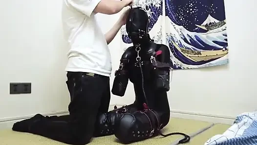 Mz08 - the Bound in Latex Suit Reaches Climax