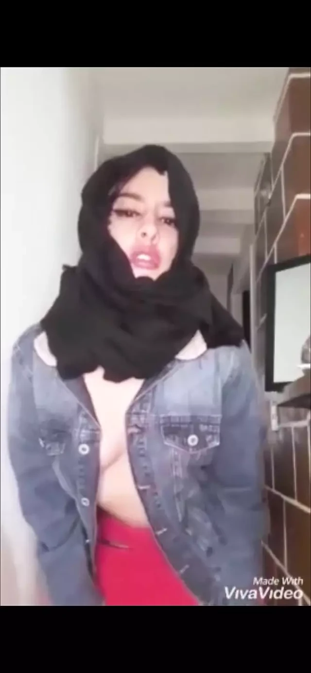 Arab wearing burqa and kneeling for her master