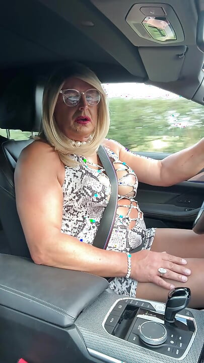Sexy Crossdresser kellycd2022 in white animal print and pantyhose enjoying an afternoon drive