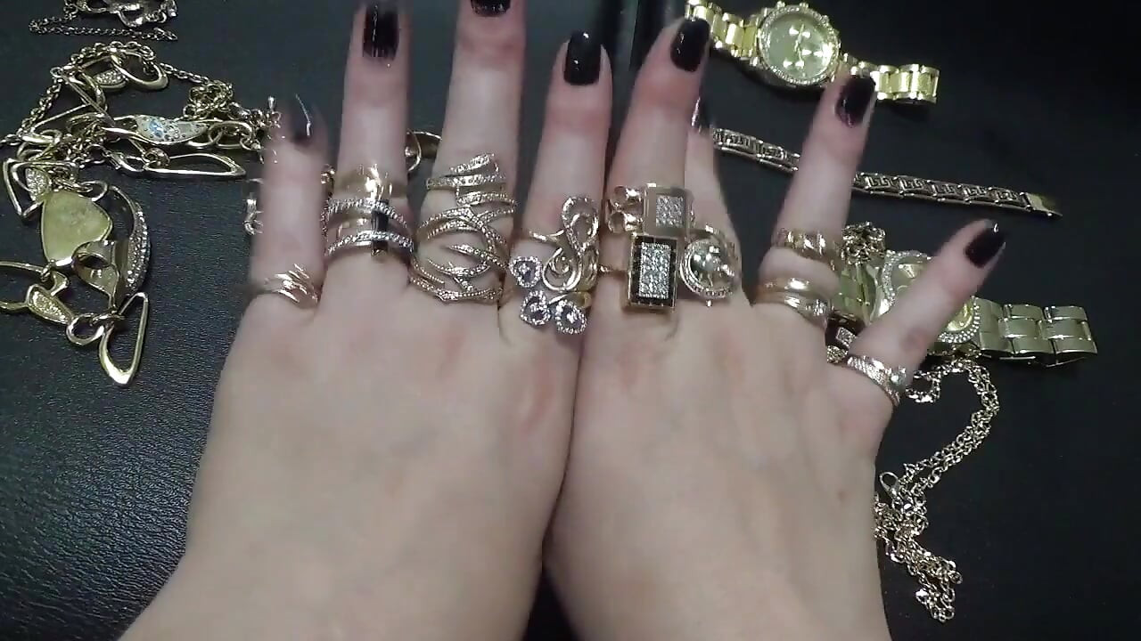 Golden jewelry and hand fetish