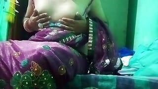 Indian Gay Crossdresser in pink saree pressing and milking his boobs so hard and enjoying the hardcore sex