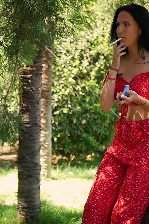 Seductive Russian Beauty Smoking Slim Cigarette Outdoors
