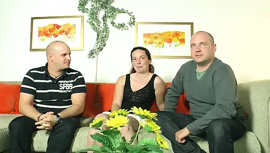 Nasty German slut sprayed with jizz after hot threeway fuck