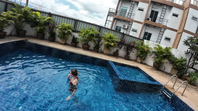 watch us playing in our swimming pool