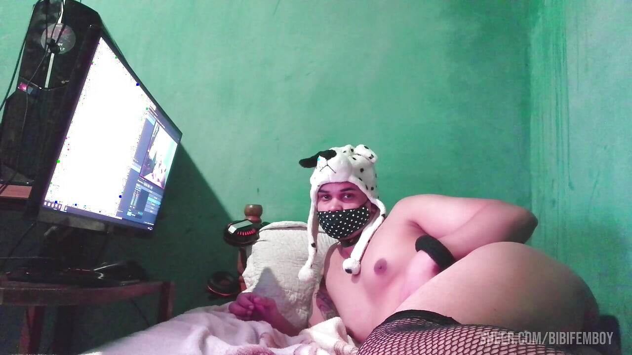 Slutty tranny with a big ass, spreading their legs and masturbating their dick.