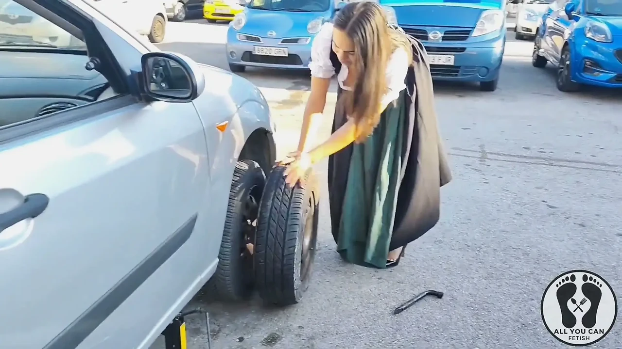 Dirndl Slut Gets Dirty and Oily Changing Tires