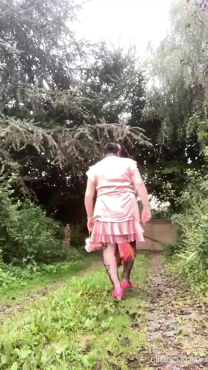 Dressed with a pink ruffle dress for a night out