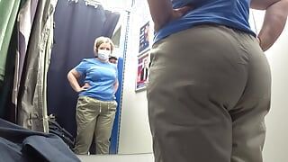 The camera in the fitting room watches a big butt in white panties. Curvy milf tries on pants. PAWG. Amateur fetish.