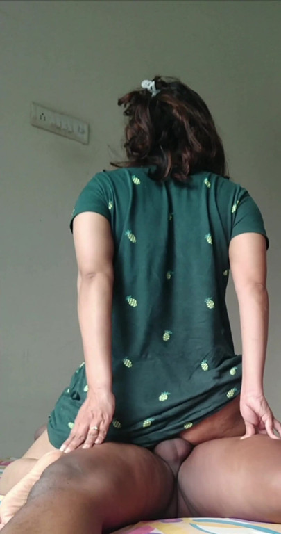 Captivating moment from "GREEN TOP DESI GIRLFRIEND RIDE BOYFRIEND CUM ON ASS"