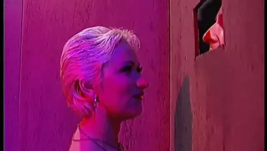 Amazing blonde slut blows a few cocks and swallows a glass of semen in the secret room