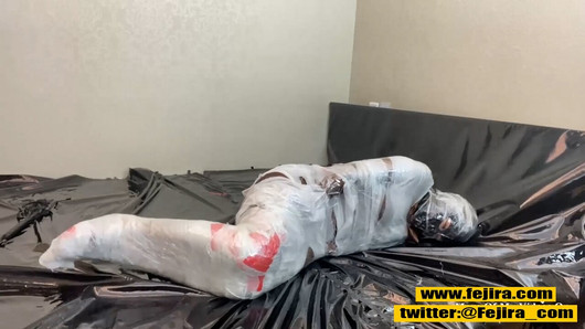 Fejira com Fetish girl mummification wrap