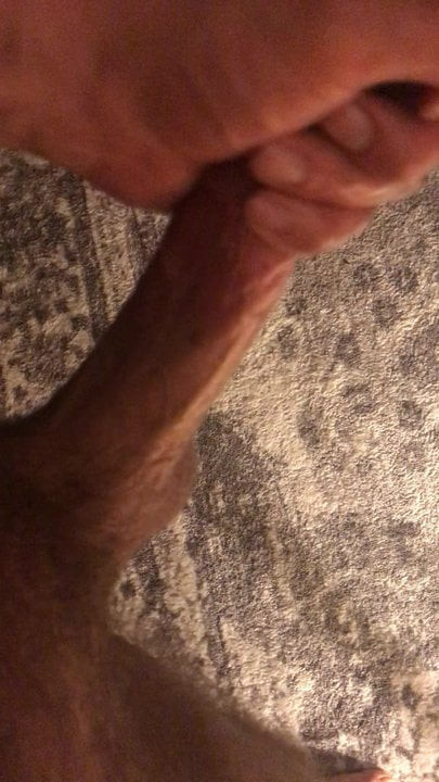 Masturbating