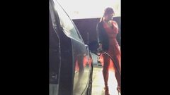 Gas Station in a Red Dress on a Windy Day