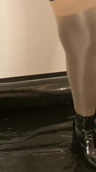 Iconic moment from "Spandex, Nylons, Heels Pissing and Masturbation Bondage"
