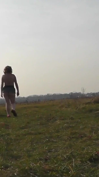 Jaw-dropping moment from "Naked in public. Outdoors sexy woman Milf without panties and bra playing sports Outside. Natural"