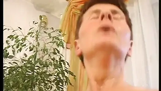 Ugly grandma with boy haircut fucks a handsome boy