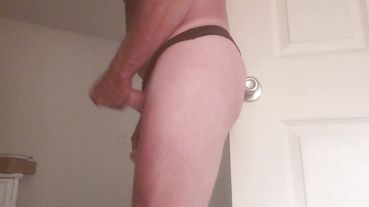Anal play in my black satin thong.