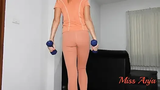 Dripping Sweat in Tight Orange Leggings