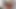 ブルネットの女の子が、きつい膣に長いチンポを受けて自慰行為をしている