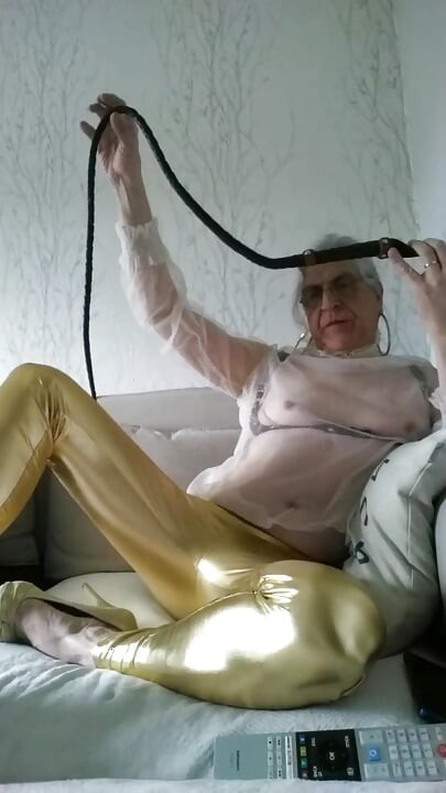 Whore in Leggings with a Whip