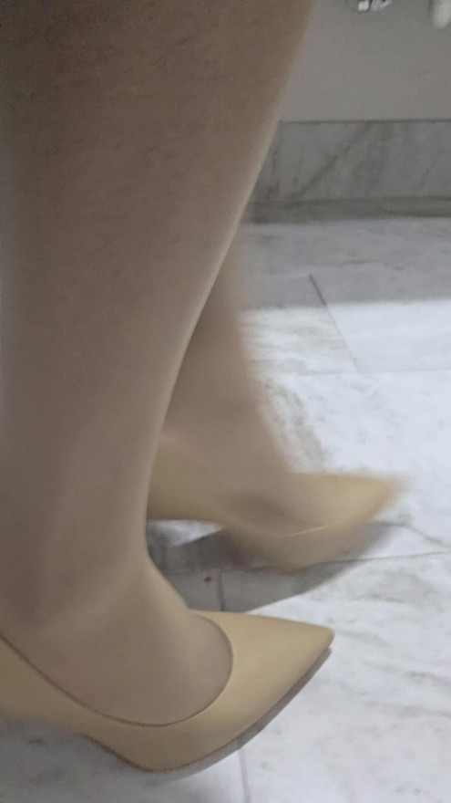 Tapping my high heels on the bathroom floor