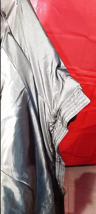 Masturbating on the lining of her black puffercoat