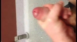 Wanking uncut cock at work
