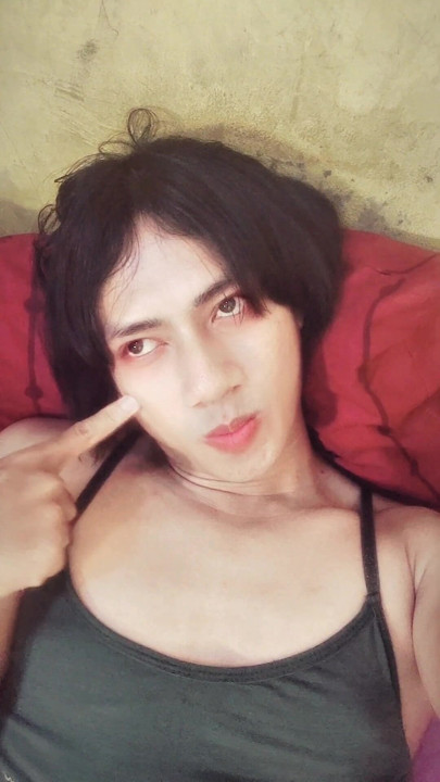 Playful femboy on camera