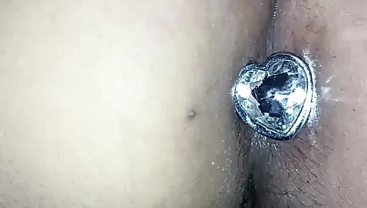I fuck her ass with an anal plug in her ass and then I put my cock in th...