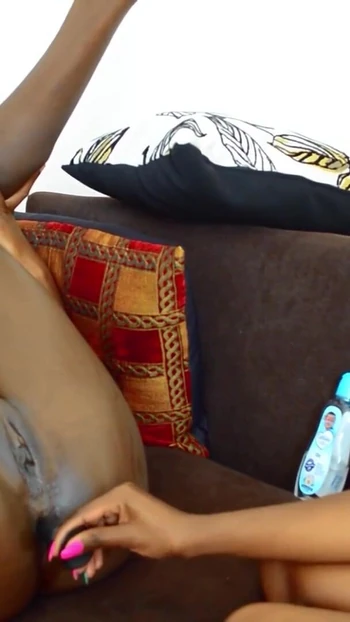 Iconic moment from "Oiled Up Big Ass Lesbians With Juicy Black Pussy Use Anal Plug To Cum"
