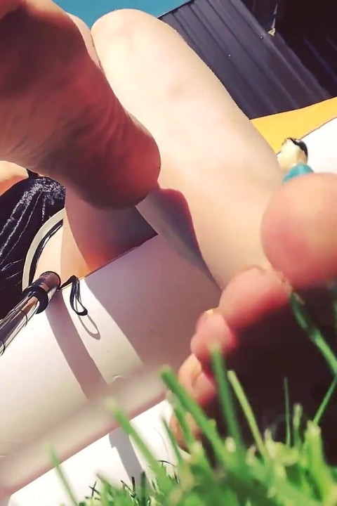 Little weak man destroyed by giantess feet outdoors