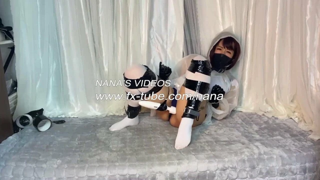 Raincoat bondage and orgasm