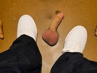 Squishing his cock with white keds
