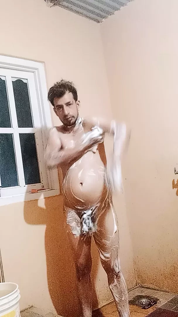 Boy bathing to showup
