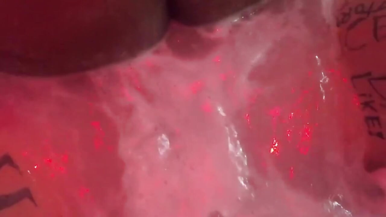 Eating brunette's big ass in the bathtub