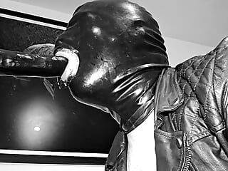 Slave deepthroat in leather and latex