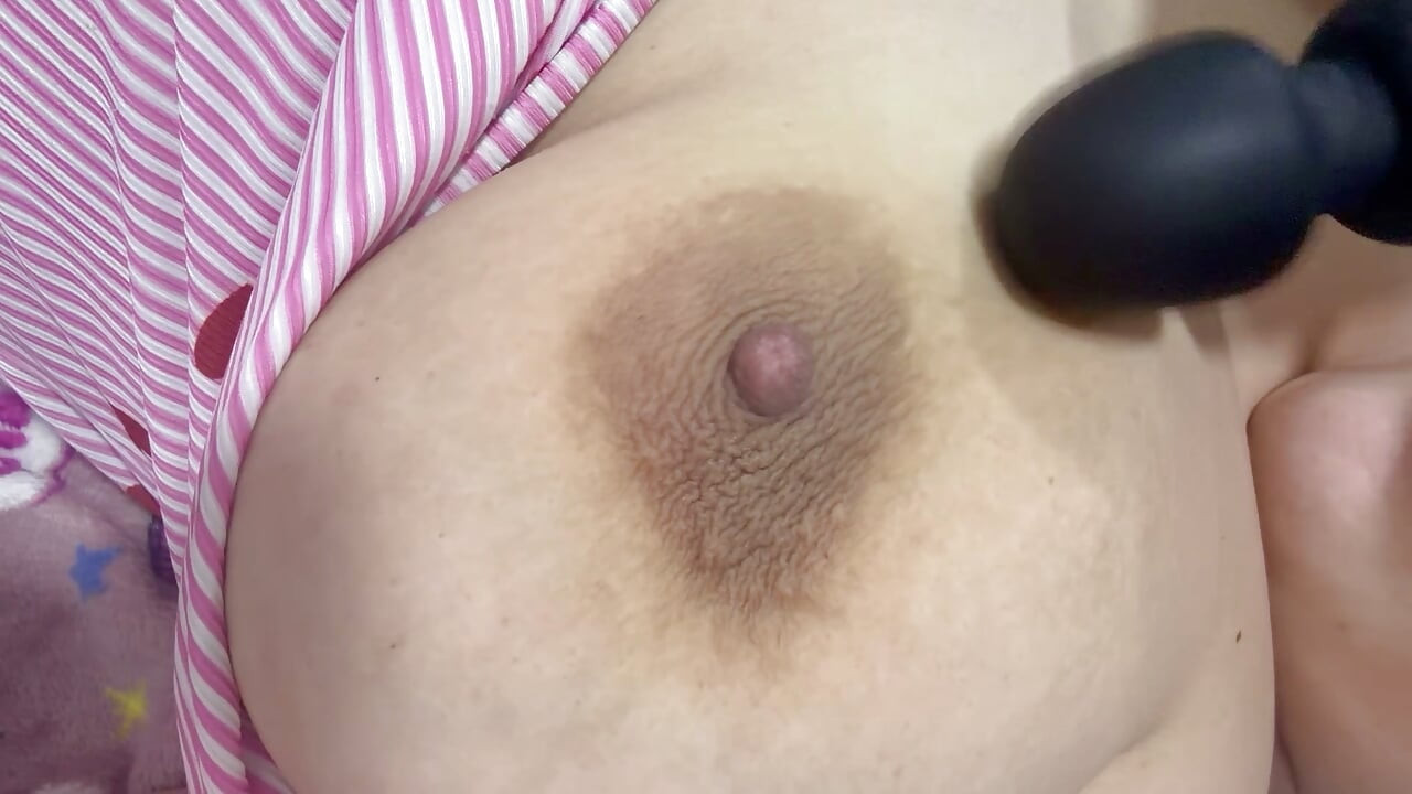 Mom plays with her vibrator and her huge tits