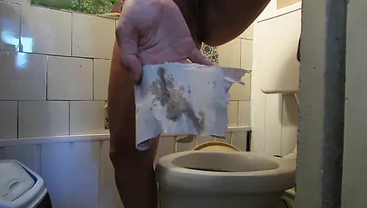 I pee in the toilet and stuff my thong into my cunt