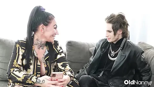 Inked Mature With Big Tits Gives Blowjob To Emo Stud