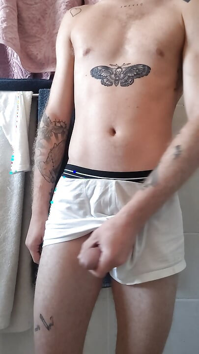 Tattoo Twink rubbing his big cock until sexy cumshot