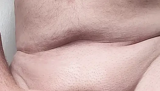 Solosexual strokes my shaved, oiled up cock to get a load of cum to swallow