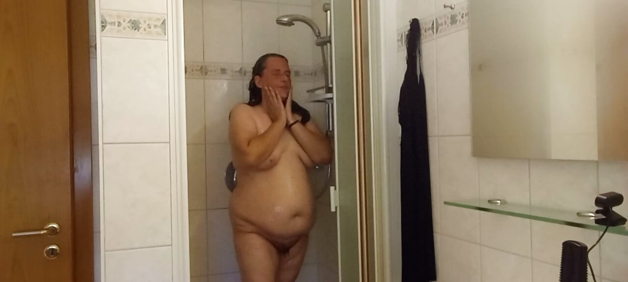 Chubby mature woman in the shower - soft belly - part 2