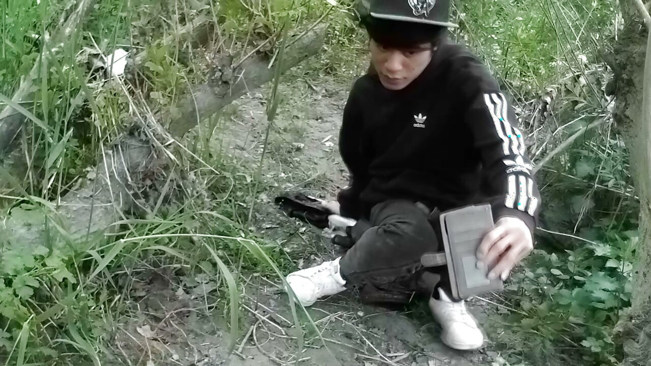 Cute Jon Arteen Gay twink jerks off outdoors, dry-humps the air, and shoots cum through a hole in his pants