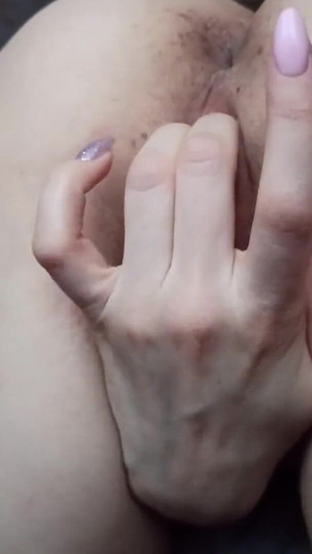 Captivating moment from "18 year old girl dreams about your cock, fingering cunt with pink nails after college"